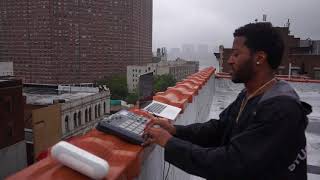 Austin Millz Makes A Beat On A Rooftop