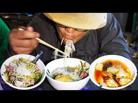 Morning food market scenes, eating delicious noodle soup, Cambodian food market