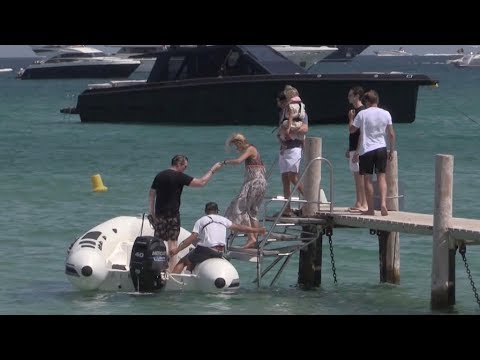 EXCLUSIVE - Natasha Poly leaving Club 55 by boat in Saint Tropez