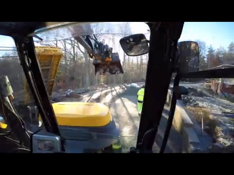 Hardscaping; a retaining wall with Mecalac excavator - Part 2