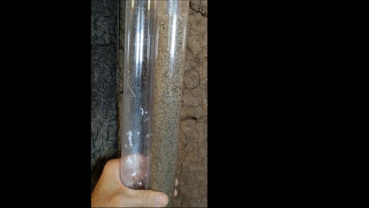 Drainable porosity compacted sand