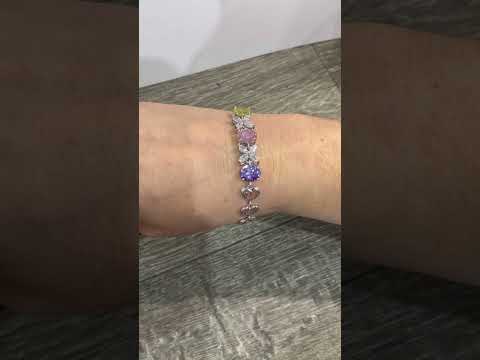 Жіночий браслет "Ніжні пелюстки з яскравими цирконами в білому золоті" - оригінальний подарунок дівчині - фото 1 - id-p2014204663