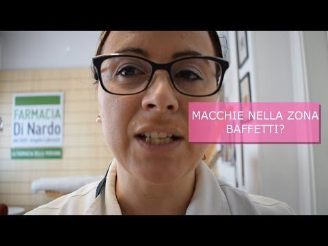 I pigmentary notano al piccolo bambino Eliminazione di pigmentazione senile su una faccia