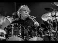 Carlos Santana drummer,  Michael Shrieve , answers questions on Woodstock and Performs Jingo.