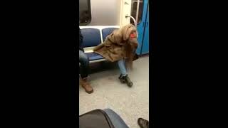 The girl-junkie under hard drugs on the russian subway. Девушка-торчок гасится в метро.