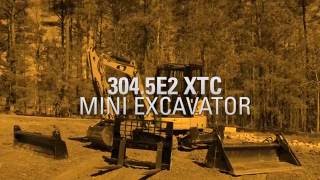 Cat® 304.5E2 XTC Mini Excavator Working with Multi Purpose Bucket