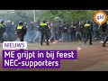 ME houdt NEC supporters weg bij hoofdingang na overwinning