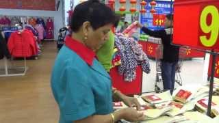 preview picture of video 'Aruna & Hari Sharma in Walmart Changchun, China Sep 05, 2013'