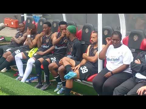 Tito and Mfundo Vilakazi on the same bench at the Carling All Stars match