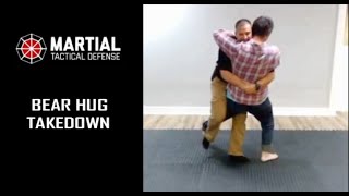 Bear hug trip takedown pin