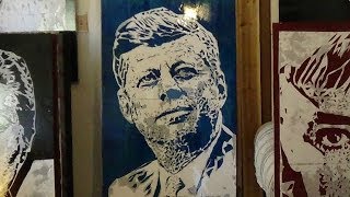 John F. Kennedy cut out of paper portrait.