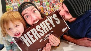 Adley eats a GIANT CHOCOLATE!!  (taste test)