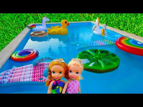 Elsa and Anna toddlers swimming pool games