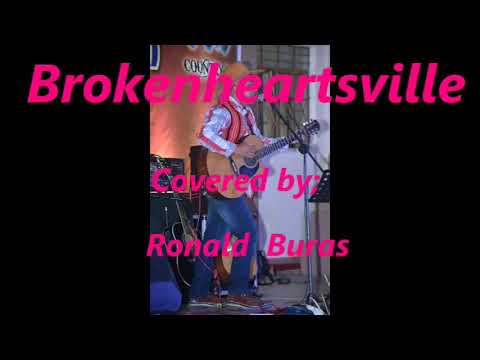 BROKENHEARTSVILLE (cover) = RONALD BURAS