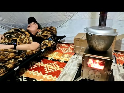 A MARRIED COUPLE SPENDS THE NIGHT ON A FROZEN LAKE AND CATCHES FISH!