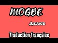 ASAKE MOGBE traduction en français