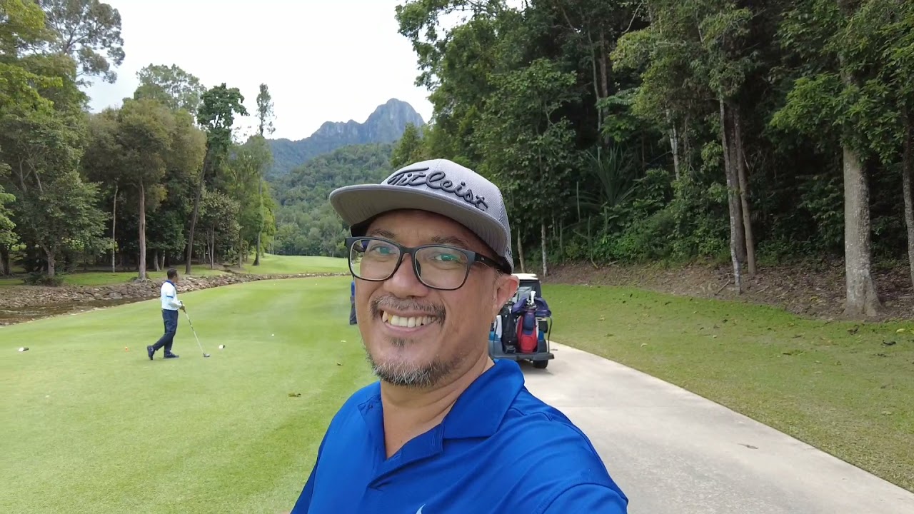 Enjoy a scenic golfing experience at Gunung Raya Golf Resort surrounded by nature!