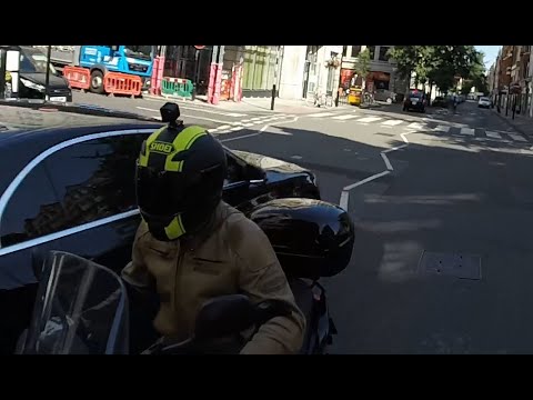 AV57YKL Scooter / Moped close pass between car, cyclist and taxi. Reported but case stopped by CPS.