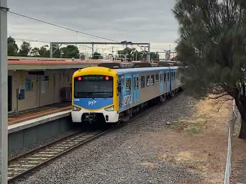 red freight train and seimens Laverton station