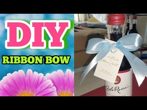 YouTube video about: How to decorate a wine bottle with ribbon?