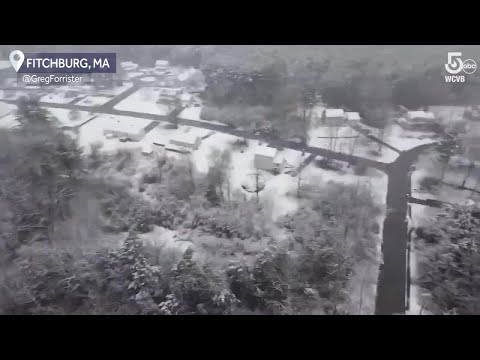 Drone flies over snowy spring day in Fitchburg