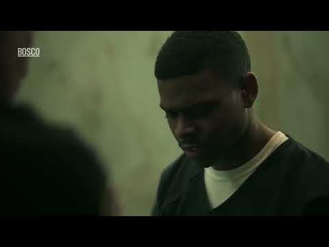 Trailer image of Bosco staring through bars while a low, ticking cue plays