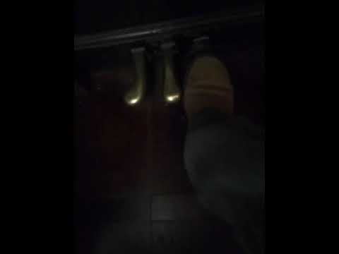 pedal pumping piano girl in brown boots.