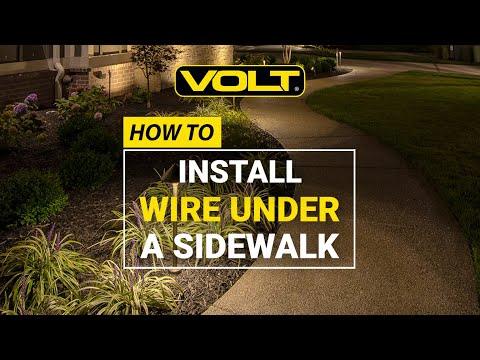 How to Run Wire Under a Sidewalk for Landscape Lighting