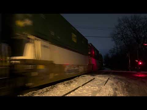 NS 4906 AC44C6M leads NS 28X with a nice crew at Piscataway 