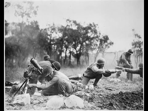 MONTAGE#FrenchArmy soldiers readying and firing massive field guns along the Maginot Line in #France