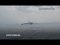 Filipino activists decide not to sail closer to disputed shoal, avoiding clash with Chinese ships - Video