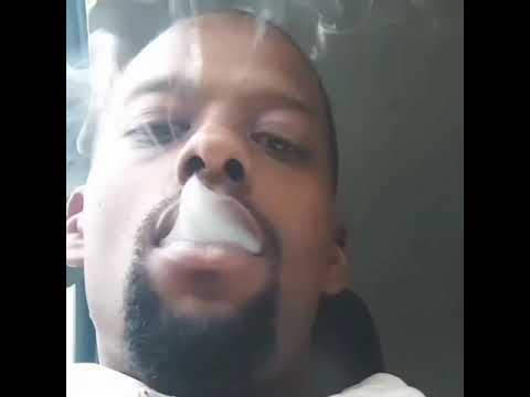 Dre Pe$o artist in his music group smoking weed El guapo Diablo