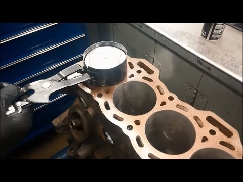 Installing a piston into a cylinder