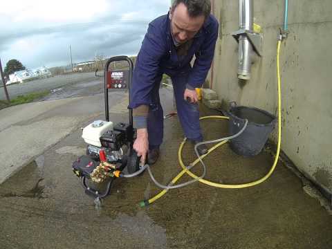 SUCKING WATER FROM A BARRELL