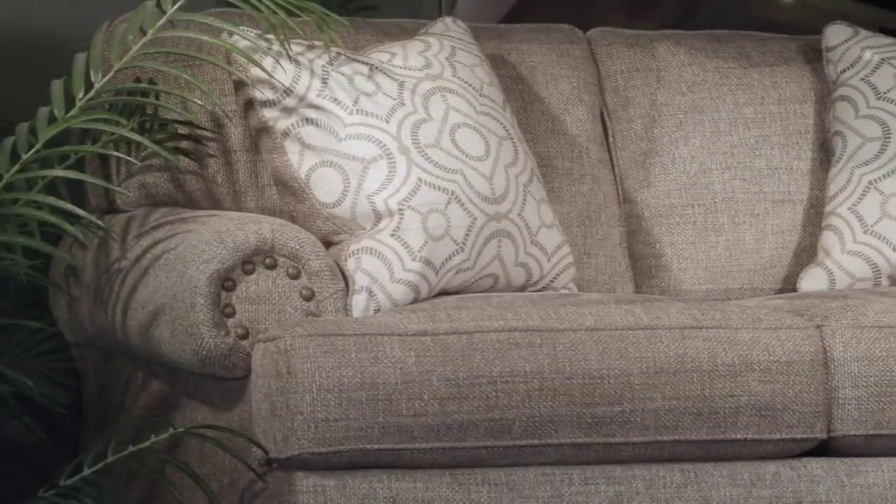Einsgrove Sandstone Loveseat from Ashley Coleman Furniture