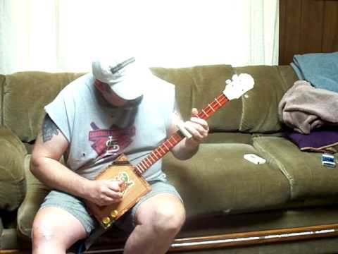 3 string Cigar Box guitar by delta grooves guitar