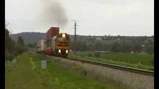 preview picture of video 'SCT Freight Train, Locomotive G & W 2214 Travelling south away from Crystal Brook,Australia.'