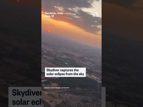Skydiver captures solar eclipse from above Italy