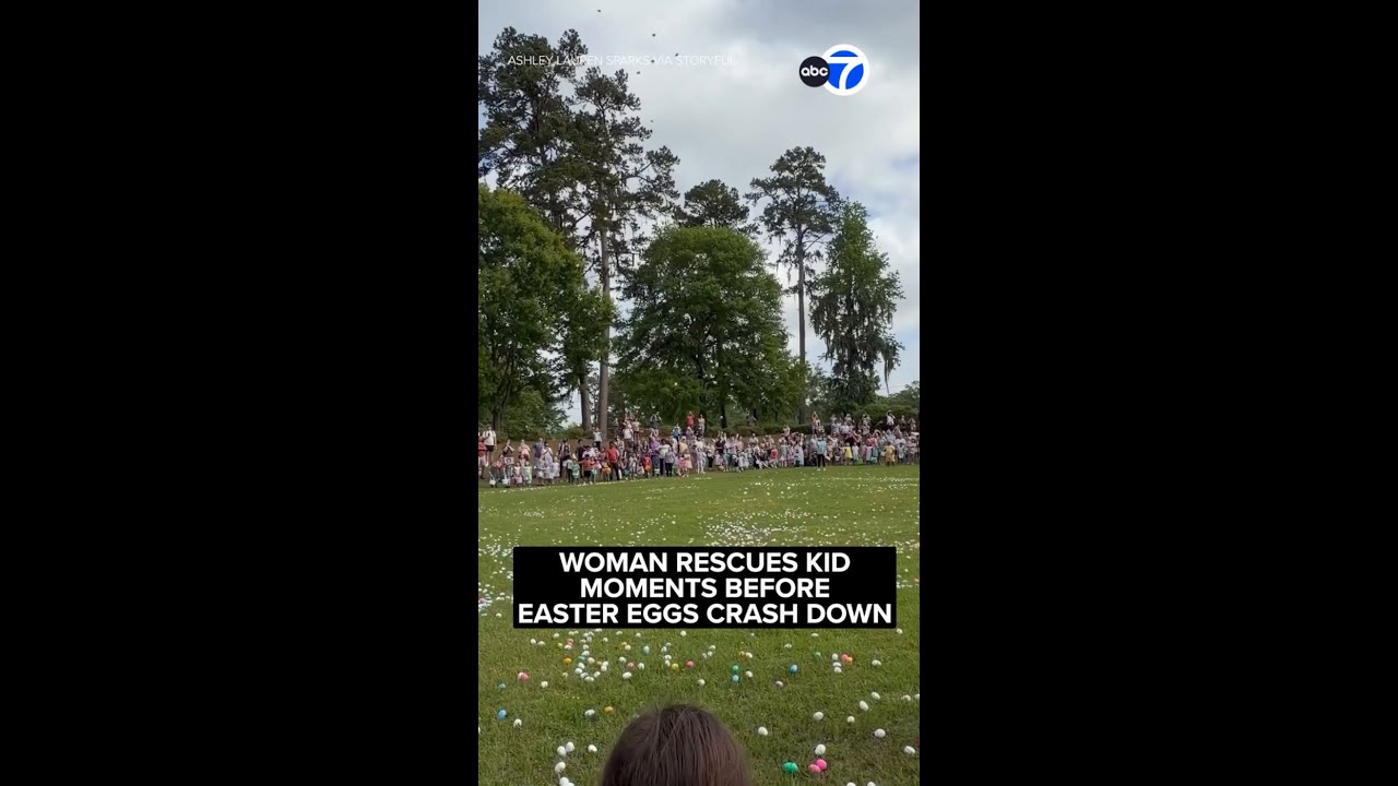 Woman rescues child moments before hundreds of Easter eggs drop