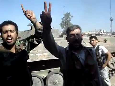 النقيب وليد المحمد الناطق باسم المكتب العسكري في تلبيسة يعلن تحرير جميع حواجز المدينة وسقوطها بيد الجيش الحر