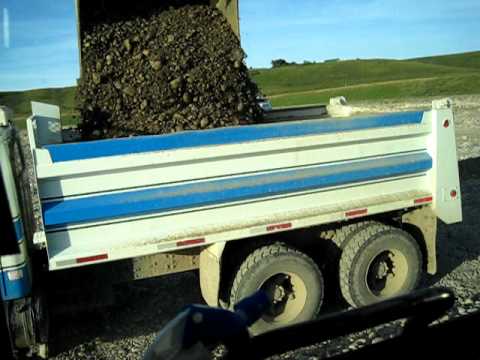 CAT 345DL Excavator Gravel Pit- Loading trucks