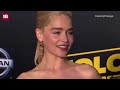 Emilia Clarke Steals The Show In Ruby Red At Solo Premiere