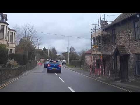 Tosser drives over pavement instead of waiting for the green light