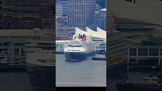 Disney Wonder gets a little help from her tug friends