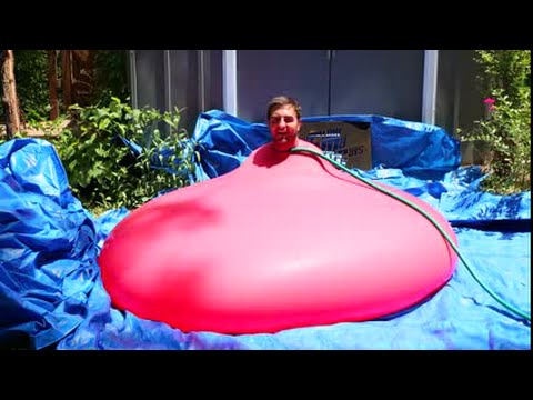 6ft Man in 6ft Giant Water Balloon - 4K - The Slow Mo Guys