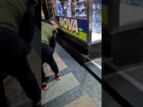 Guy Loses Balance And Crashes in Glass Display While Riding Cycle Without Holding Handles - 1268309