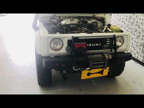 SUZUKI SAMURAI COM TETO ALTO, instalação de Buzina Verdureiro Tripla.