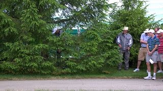 Dustin Johnson advances ball on cart path at the Memorial