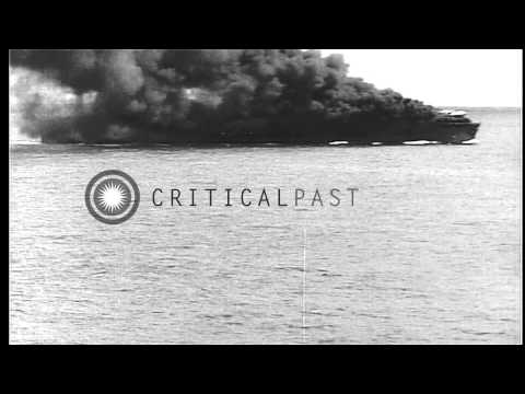 Japanese zero makes kamikaze dive on USS Suwanee (CVE-27), and impacts deck, as s...HD Stock Footage