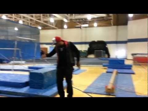 Rico Rossi does a back-flip in the Thornton HS gym before the performance